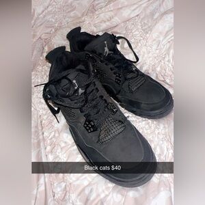 All black retro Jordan’s (Black Cats)